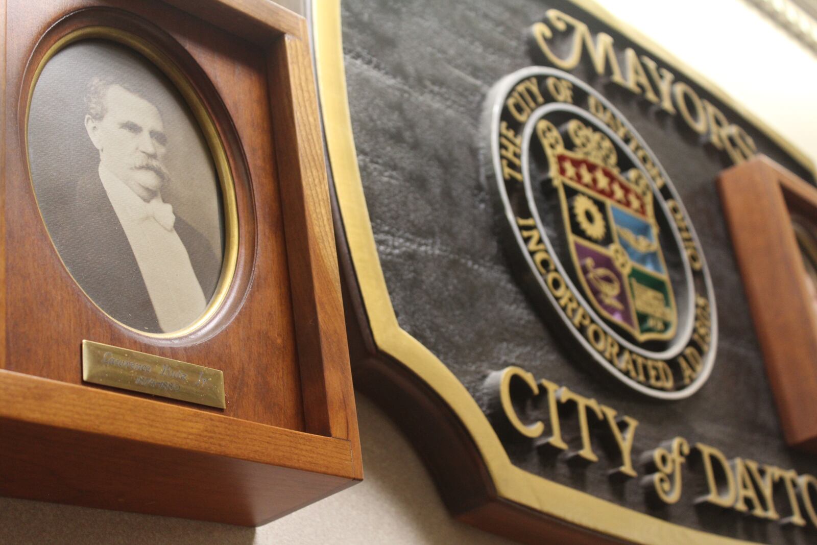 The city of Dayton had the wrong portrait of Mayor Lawrence Butz on its wall. There were about eight mayor portraits out of place, and still others may be incorrect. CORNELIUS FROLIK / STAFF