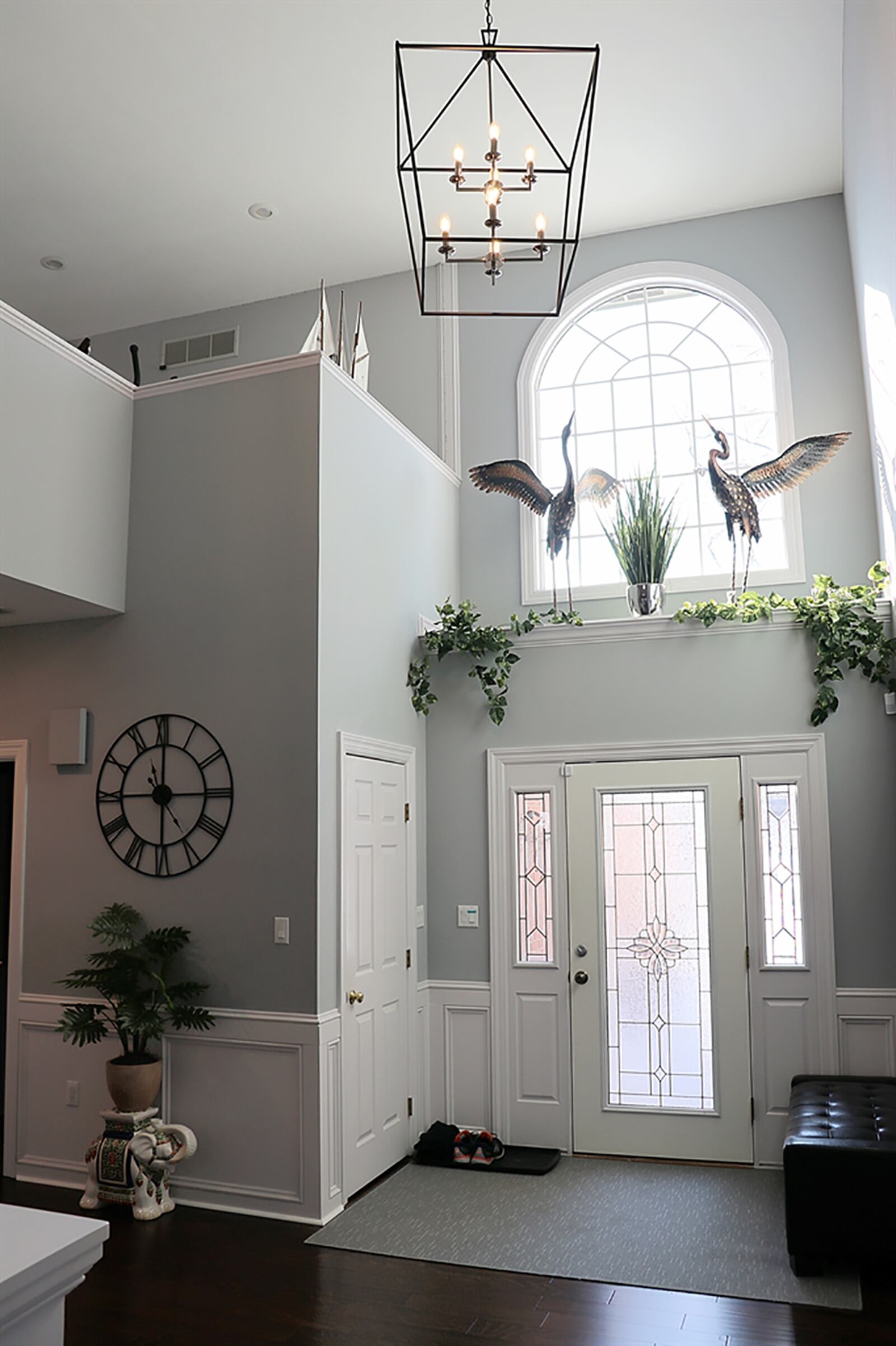 Formal entry opens into a 2-story foyer with an arched window above a plant shelf that allows plenty of natural light to filter into the foyer. Hardwood flooring fills the foyer and continues throughout the main level. CONTRIBUTED PHOTO BY KATHY TYLER