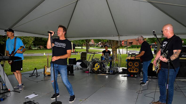 The band Stranger performs at a block party Aug. 12 put on by the 88th Force Support Squadron in the historic Brick Quarters housing area at Wright-Patterson Air Force Base. The next party, the last in the summer series, is slated to feature “Parrots of the Caribbean,” a Jimmy Buffett tribute band, on Aug. 26. U.S. AIR FORCE PHOTO/R.J. ORIEZ