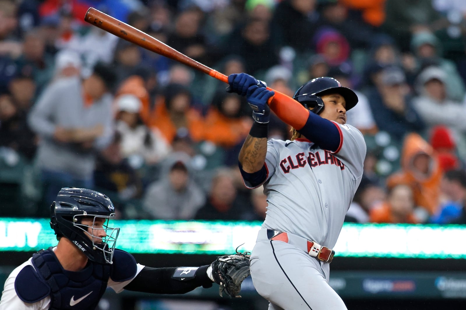 Cleveland Guardians' José Ramírez singles against the Detroit Tigers during the fourth inning of a baseball game Thursday, May 22, 2025, in Detroit. (AP Photo/Duane Burleson)