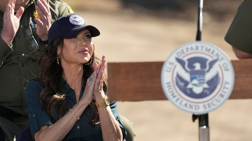 Kristi Noem, Secretary of the Department of Homeland Security, applauds a speaker during an event at the border with Mexico, Wednesday, Feb. 4, 2026, in Nogales, Ariz. (AP Photo/Ross D. Franklin)