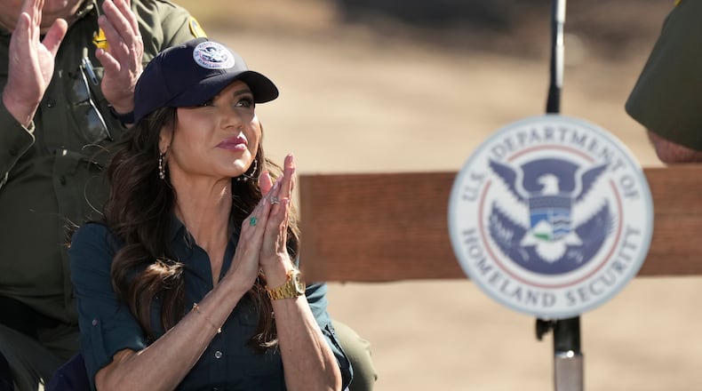 Kristi Noem, Secretary of the Department of Homeland Security, applauds a speaker during an event at the border with Mexico, Wednesday, Feb. 4, 2026, in Nogales, Ariz. (AP Photo/Ross D. Franklin)