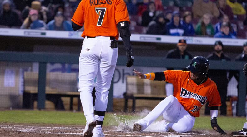 Dragons outfielder Allan Cerda scores on a wild pitch during the third inning of the season opener on April 8, 2022 at DayAir Ballpark. Jeff Gilbert/CONTRIBUTED