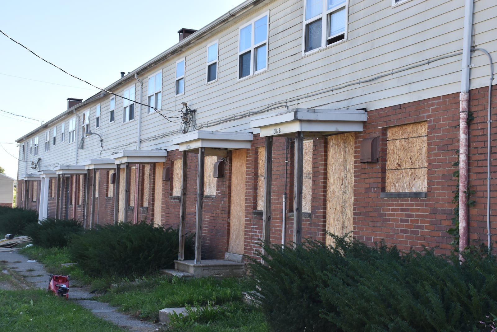 The Bancroft Apartments in West Dayton are now vacant and boarded up, after ownership lost a Section 8 housing assistance contract with the U.S. Department of Housing and Urban Development. The apartments are across from the DeSoto Bass Courts public housing project, which is being redeveloped. CORNELIUS FROLIK /STAFF