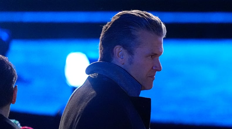 Defense Secretary Pete Hegseth arrives before the lighting of the National Christmas Tree on the Ellipse, Thursday, Dec. 4, 2025, near the White House in Washington. (AP Photo/Julia Demaree Nikhinson)