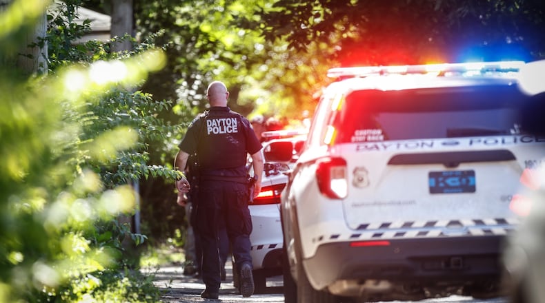 Dayton police investigate a shooting reported June 22, 2021, on Salem Avenue near Grand Avenue in Dayton. JIM NOELKER/STAFF