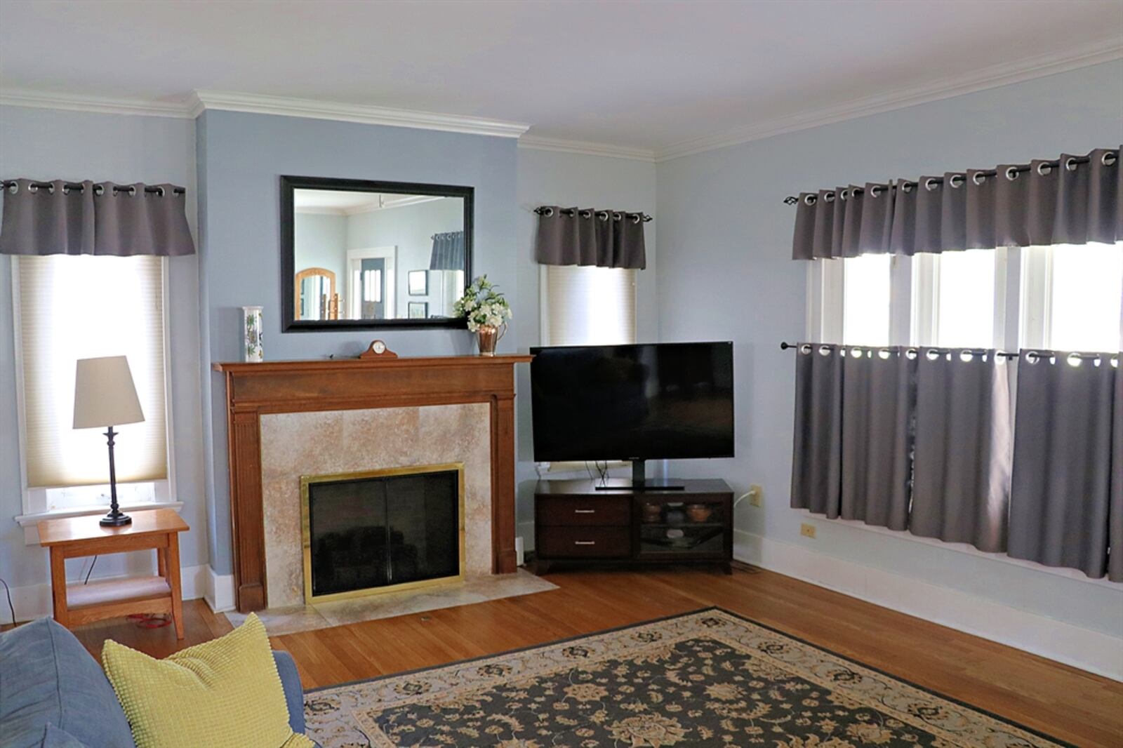 Located on one of the tree-lined boulevards of Oakwood, this two-story home at 14 E. Dixon Ave. in Oakwood has a traditional floor plan with some cozy built-ins and upstairs flexible space. CONTRIBUTED
