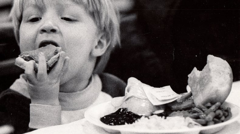 Robert Runkle enjoys a slice of pumpkin pie at the Beerman Thanksgiving dinner in 1980. DAYTON DAILY NEWS / WRIGHT STATE UNIVERSITY SPECIAL COLLECTIONS