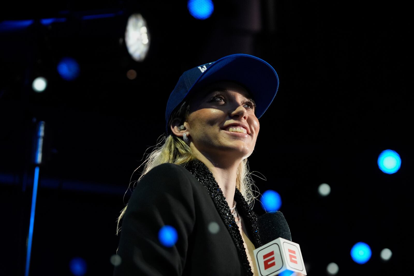 UConn's Paige Bueckers listens during an interview at the WNBA basketball draft, Monday, April 14, 2025, in New York. (AP Photo/Pamela Smith)