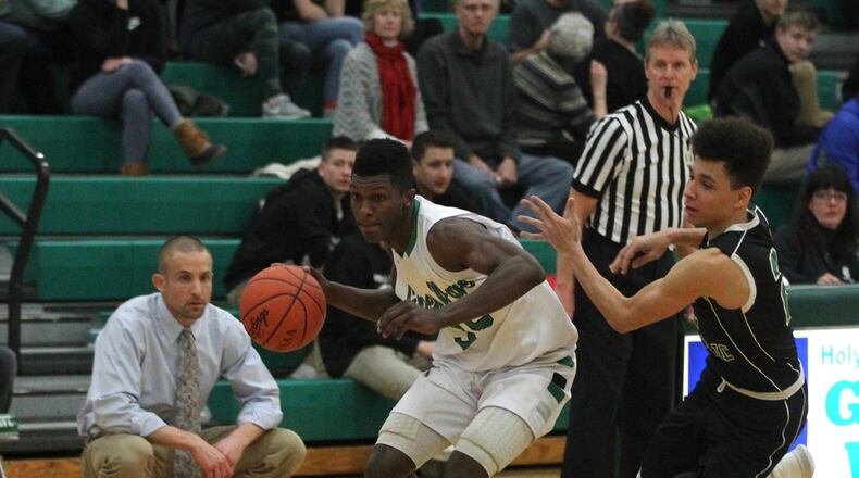 Dayton basketball recruit Dwayne Cohill, of Holy Name High School, plays against Elyria Catholic on Tuesday, Jan. 30, 2018, in Parma Heights, Ohio. David Jablonski/Staff
