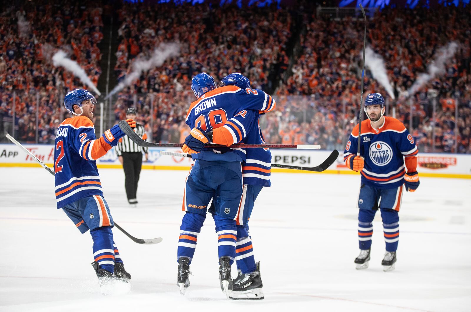 Edmonton Oilers' Evan Bouchard (2), Connor Brown (28), Evander Kane (91) and Jake Walman (96) celebrate a goal against the Los Angeles Kings during the second period of an NHL hockey playoff game in Edmonton, Alberta, Friday, April 25, 2025. (Jason Franson/The Canadian Press via AP)