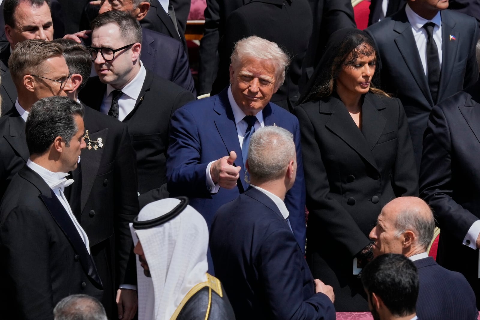FILE - President Donald Trump, center, gives the thumbs up at the end of the funeral of Pope Francis in St. Peter's Square at the Vatican, April 26, 2025. (AP Photo/Gregorio Borgia, File)