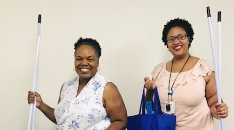 MVHO Staffers Daisy Nease (left) and Chrystal Steward show off the everyday essentials that are always needed. CONTRIBUTED