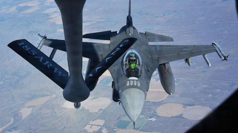 An F-16 Fighting Falcon from the 114th Fighter Wing prepares to receive fuel from a KC-135 Stratotanker assigned to the 185th Air Refueling Wing over the Midwest on October 31, 2025. (Air National Guard photo by Staff Sgt. Olivia Monk).