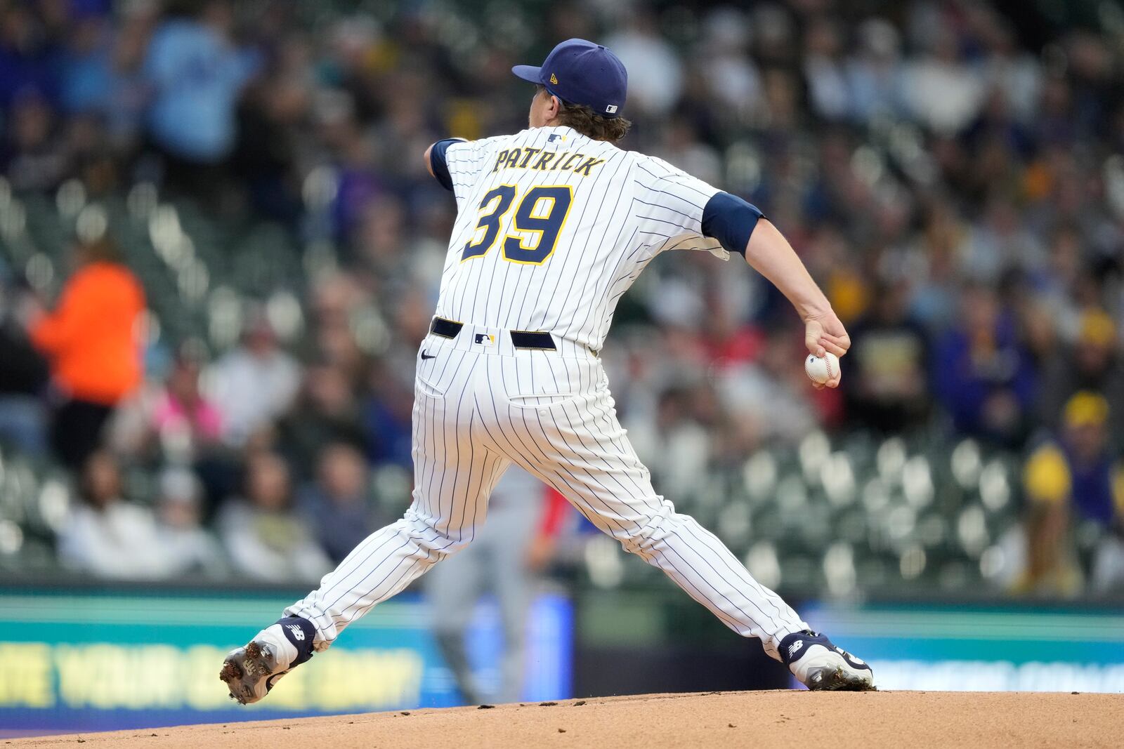 Milwaukee Brewers' Chad Patrick pitches during the first inning of a baseball game against the Cincinnati Reds, Sunday, April 6, 2025, in Milwaukee. (AP Photo/Aaron Gash)