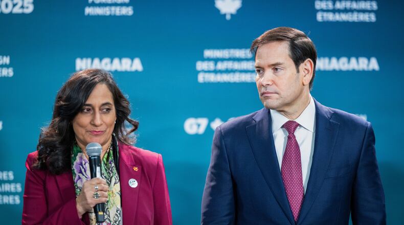 U.S. Secretary of State Marco Rubio, right, stands beside Canada's Minister of Foreign Affairs Anita Anand, as she speaks ahead of the family photo during the G7 Foreign Ministers' Meeting in Niagara-on-the-Lake, Ontario, on Tuesday, Nov. 11, 2025. (Nick Iwanyshyn/The Canadian Press via AP)