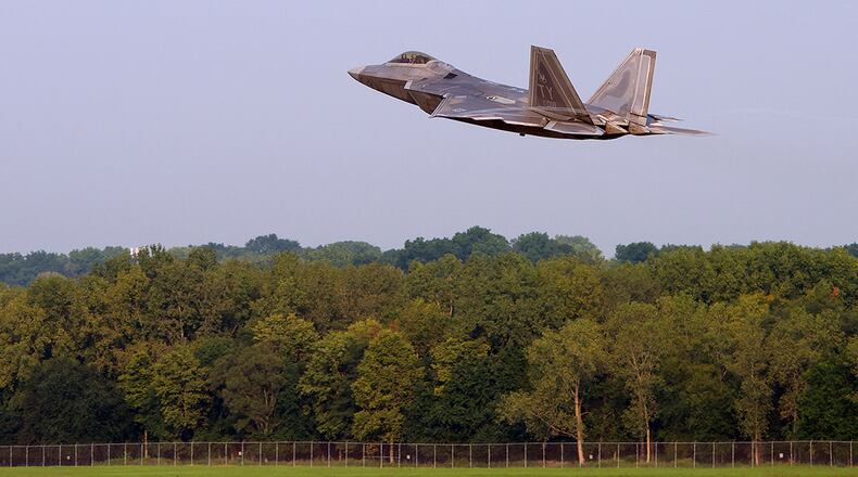 A U.S. Air Force F-22 Raptor with the 325th Fighter Wing, takes off from Wright-Patterson Air Force Base Aug. 26, heading back home to Eglin AFB, Fla. The 325th FW evacuated some of its aircraft to Wright-Patterson to avoid tropical storms threatening their home base. (U.S. Air Force photo/Airman 1st Class Alexandria Fulton)