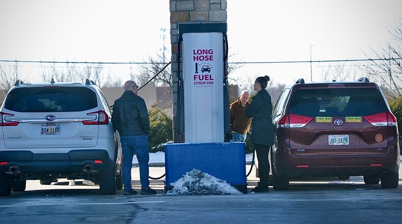 These shoppers are trying to save money by purchasing their gas at Costco on Feedwire Road. The average price of gas nationwide has increased for the past four weeks, with the average price in Ohio climbing 30 cents between Feb. 8 and Feb. 15, according to AAA. MARSHALL GORBY/STAFF