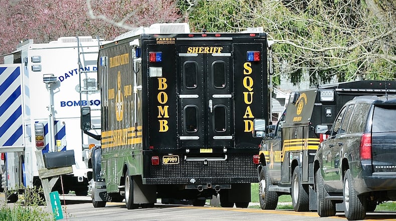 Several bomb squad, including Dayton and Franklin county at a home in Troy on Barnhart Rd., Friday April 5, 2024. MARSHALL GORBY \STAFF