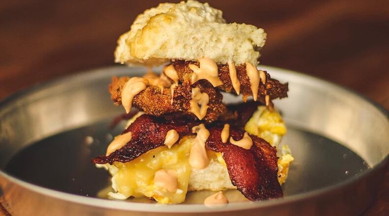One of Lock 27's brunch items is a house made biscuit, fried green tomatoes, eggs, cheese, bacon and chipotle aioli. Source: Facebook