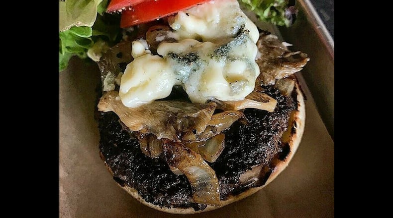 Mudlick Tap House in downtown Dayton plans to offer three burgers as part of Dayton Burger Week 2018: its signature Black Hawk Farms wagyu beef burger, its white bean tabbouleh burger and one created by the winner of a social media contest that comes with a pair of tickets to the Bonnaroo Music and Arts Festival.