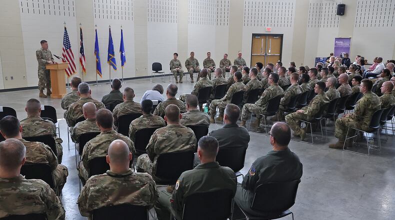 Airmen with the 178th Wing of the Ohio Air National Guard and their families participated in a Call to Duty Ceremony Sunday at the Springfield National Guard Base. The airmen are deploying in support of the Air Force Central Command to provide tactical command and control capabilities. BILL LACKEY/STAFF