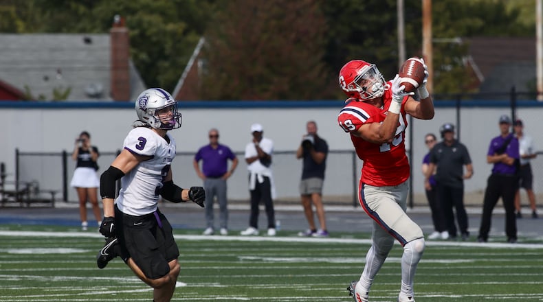 Dayton's Jake Coleman makes a catch against St. Thomas in the final minutes on Saturday, Sept. 30, 2023, at Welcome Stadium. David Jablonski/Staff