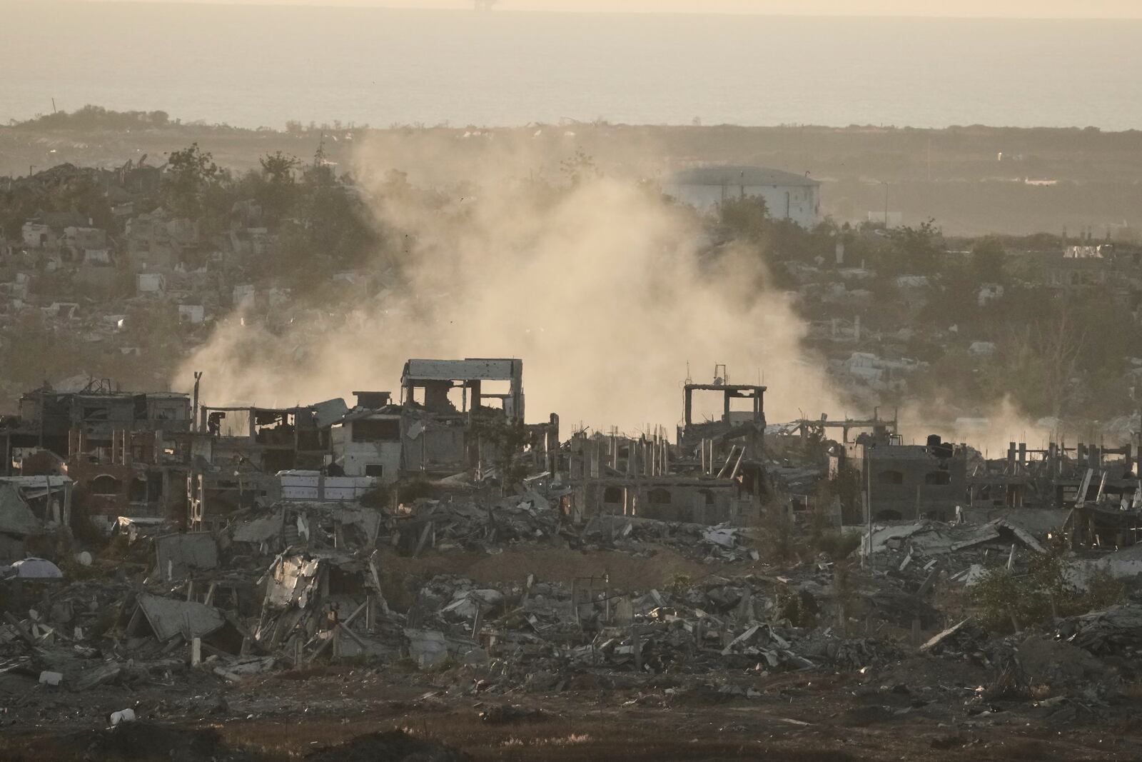 Smoke rises following an Israeli army bombardment in Gaza Strip, seen from southern Israel, Tuesday, May 20, 2025. (AP Photo/Maya Alleruzzo)