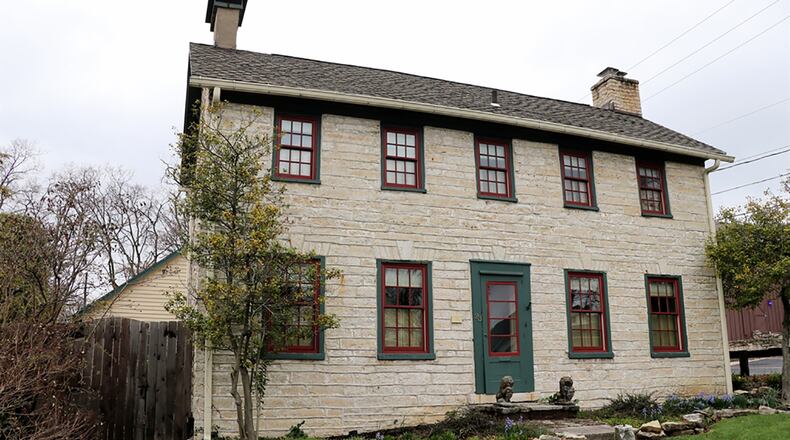 One of the 23 remaining stone buildings in Centerville, this updated 2-story home has about 2,020 sq. ft. of living space, 3 bedrooms and 18-inch-thick walls. The home has a courtyard stone patio and a detached, 2-car garage with upstairs finished space. CONTRIBUTED PHOTO BY KATHY TYLER