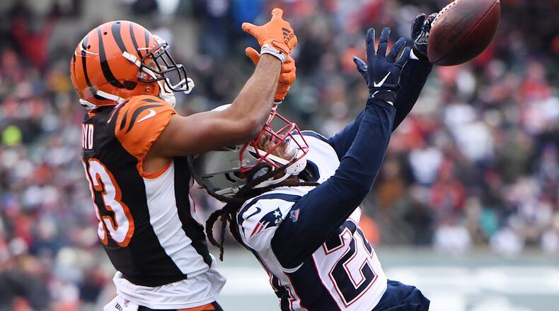 CINCINNATI, OHIO - DECEMBER 15: Stephon Gilmore #24 of the New England Patriots breaks up a pass intended for Tyler Boyd #83 of the Cincinnati Bengals during the second half in the game at Paul Brown Stadium on December 15, 2019 in Cincinnati, Ohio. (Photo by Bobby Ellis/Getty Images)