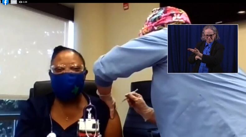 Kasi Gardner, a Springfield Regional Medical Center nurse, received the coronavirus vaccine during Gov. Mike DeWine's COVID-19 press conference on Tuesday, Dec. 15, 2020.