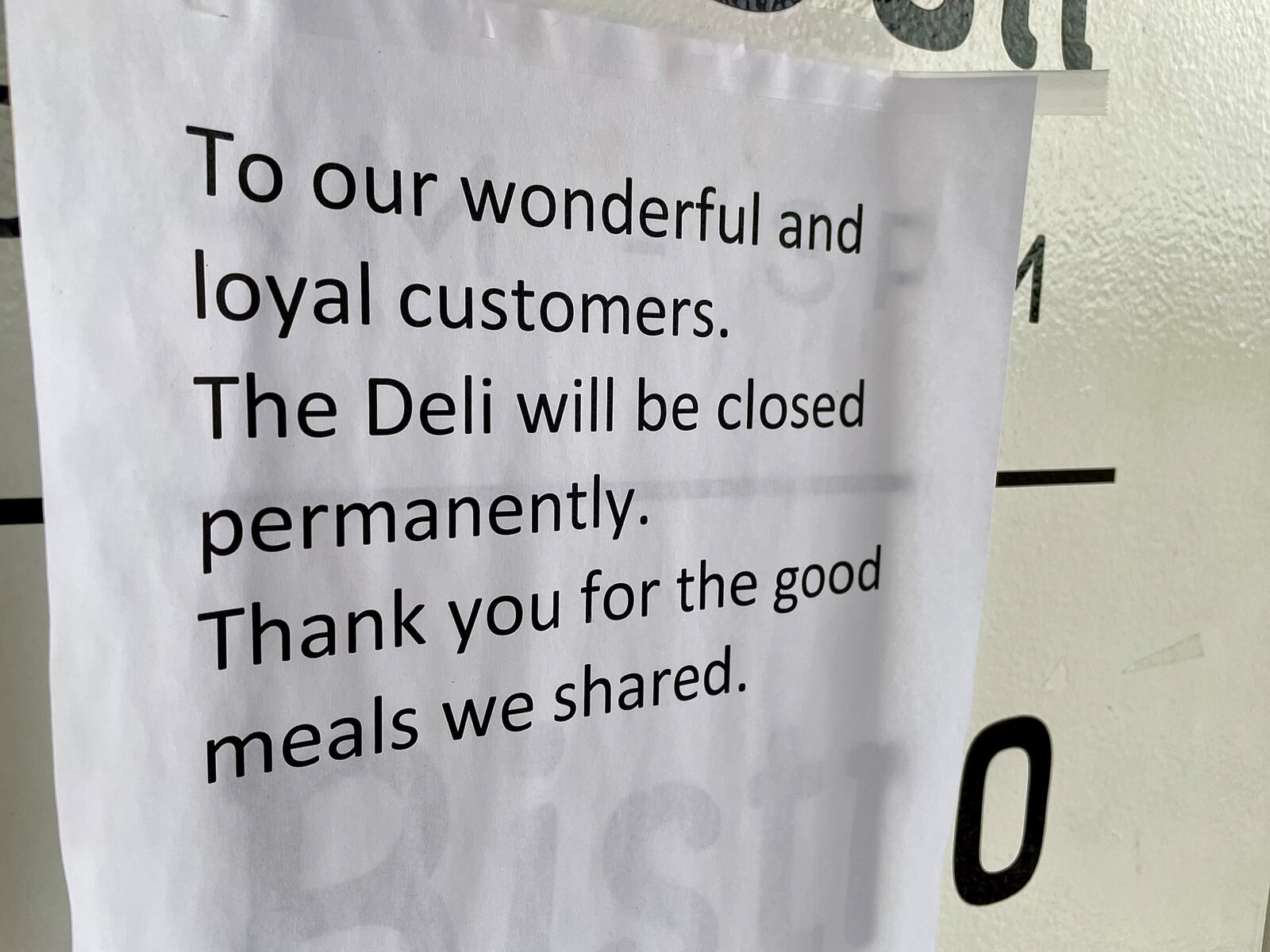 The Gourmet Deli at Top of the Market on Webster Street in Dayton is permanently closed, according to a sign posted at the restaurant. NATALIE JONES/STAFF