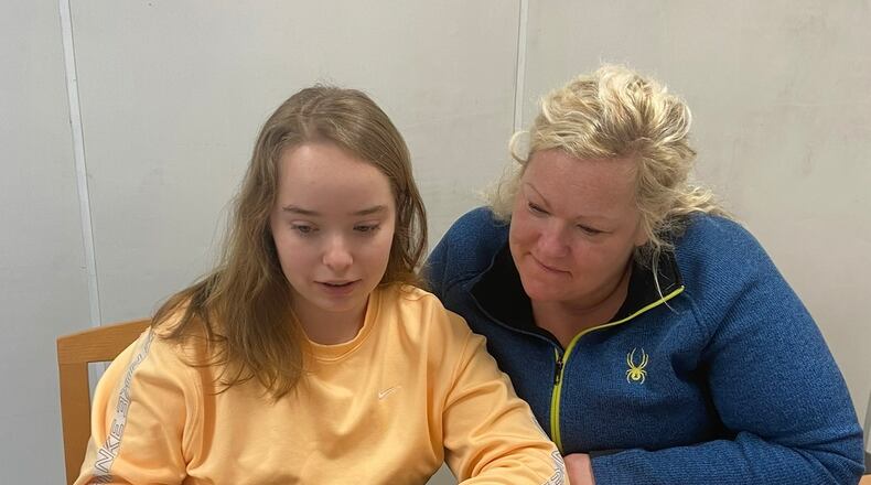 Montgomery County family receives FAFSA assistance at MCESC-sponsored workshop.