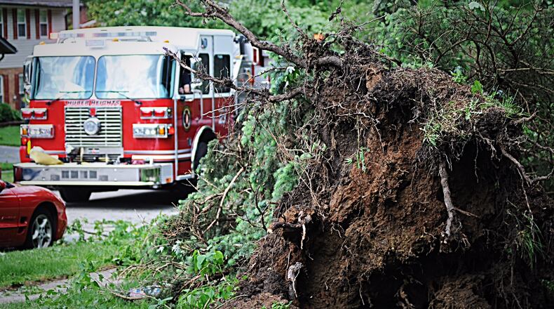 Multiple trees were down and homes were damaged in severe storms that moved through Huber Heights Sunday night. STAFF PHOTO / MARSHALL GORBY