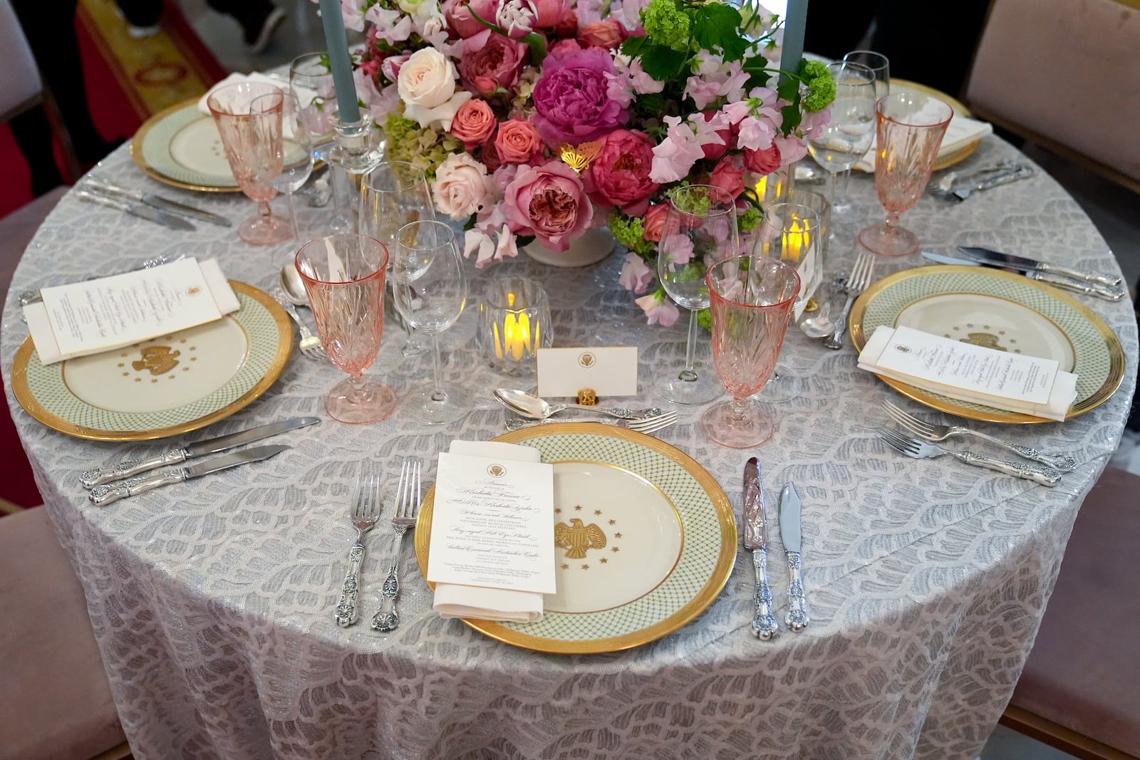 FILE - Tables are decorated during a press preview at the White House in Washington, April 9, 2024, for the State Dinner for Japan's Prime Minister Fumio Kishida. (AP Photo/Susan Walsh, File)