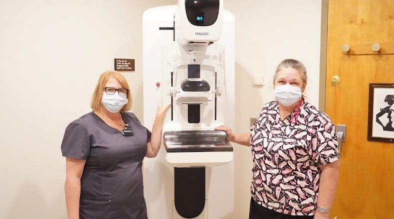 Amy Dardinger (left), a Wright-Patterson Medical Center mammography technician, and Aimee Barnes, mammography supervisor, stand ready to begin mammograms during Women’s Wellness Day on Oct. 7. They assisted over 40 women with screenings. U.S. AIR FORCE PHOTO/KENNETH STILES