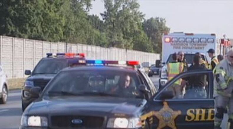 A woman was killed after a tire came off a vehicle and crashed through the windshield of a her car traveling in the opposite direction on I-75 on Thursday, July 19, 2018. STAFF