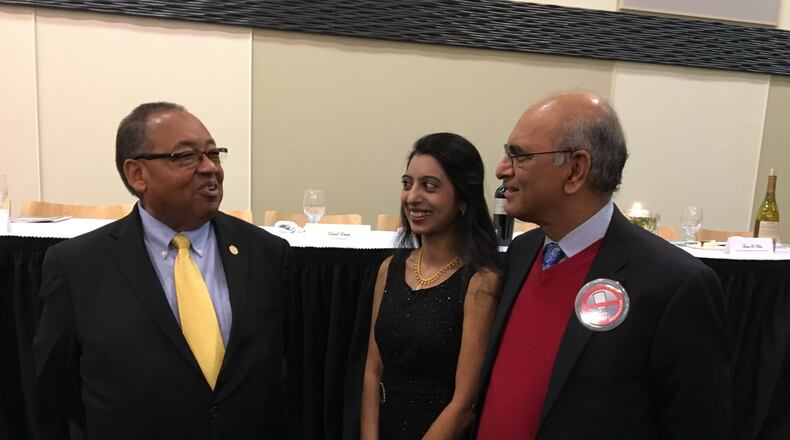 National NAACP Board Chairman Leon W. Russell meets with Dr. Soumya Neravetla and Dr. Surender Neravetla prior to the third annual Freedom Fund Banquet at the Hollenbeck Bayley Creative Arts and Conference Center on Friday, Nov. 17. Photo by Brett Turner
