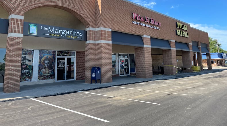 Two restaurants in Riverside, Pita N More and Las Margaritas Mexican Bar and Grill, are closed after a fire broke out at the Dollar General on Airway Road Sunday morning. NATALIE JONES/STAFF