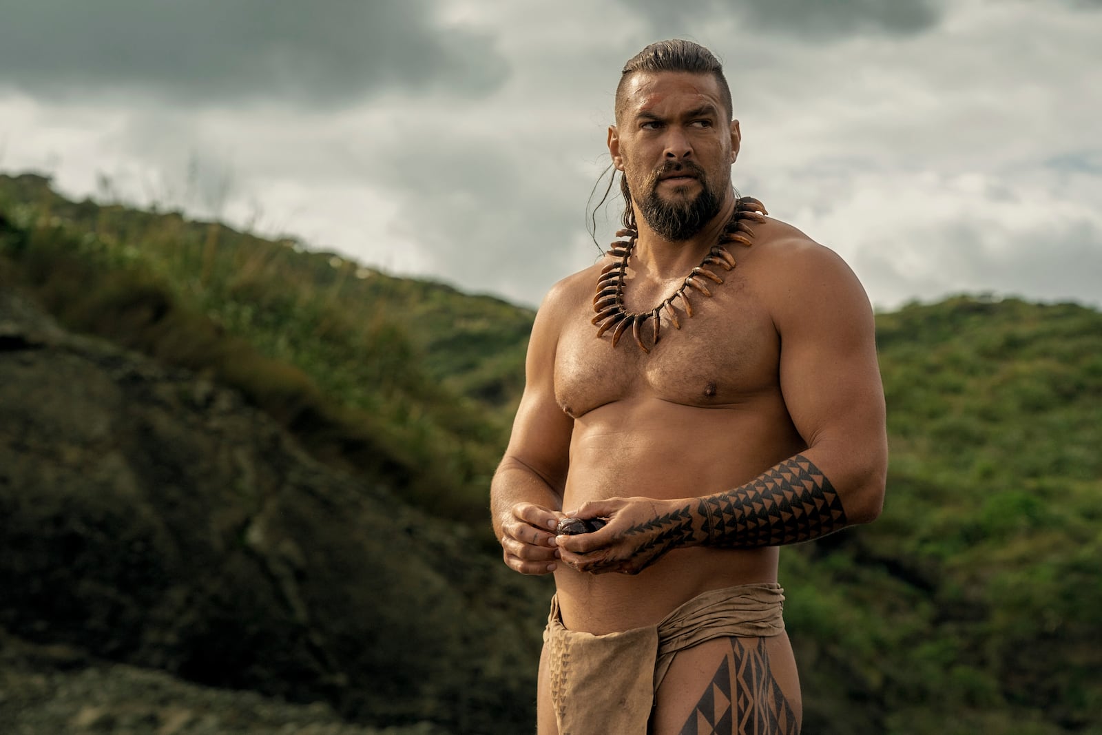 This image released by Apple TV+ shows Jason Momoa in a scene from "Chief of War." (Nicola Dove/Apple TV+ via AP)