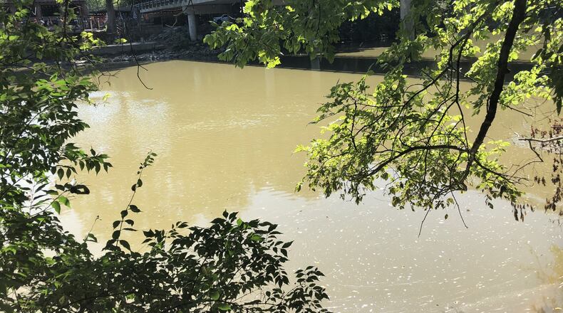 A section of the Little Miami River was closed after a sewer line was breached, sending untreated sewage into the river. STAFF/LAWRENCE BUDD