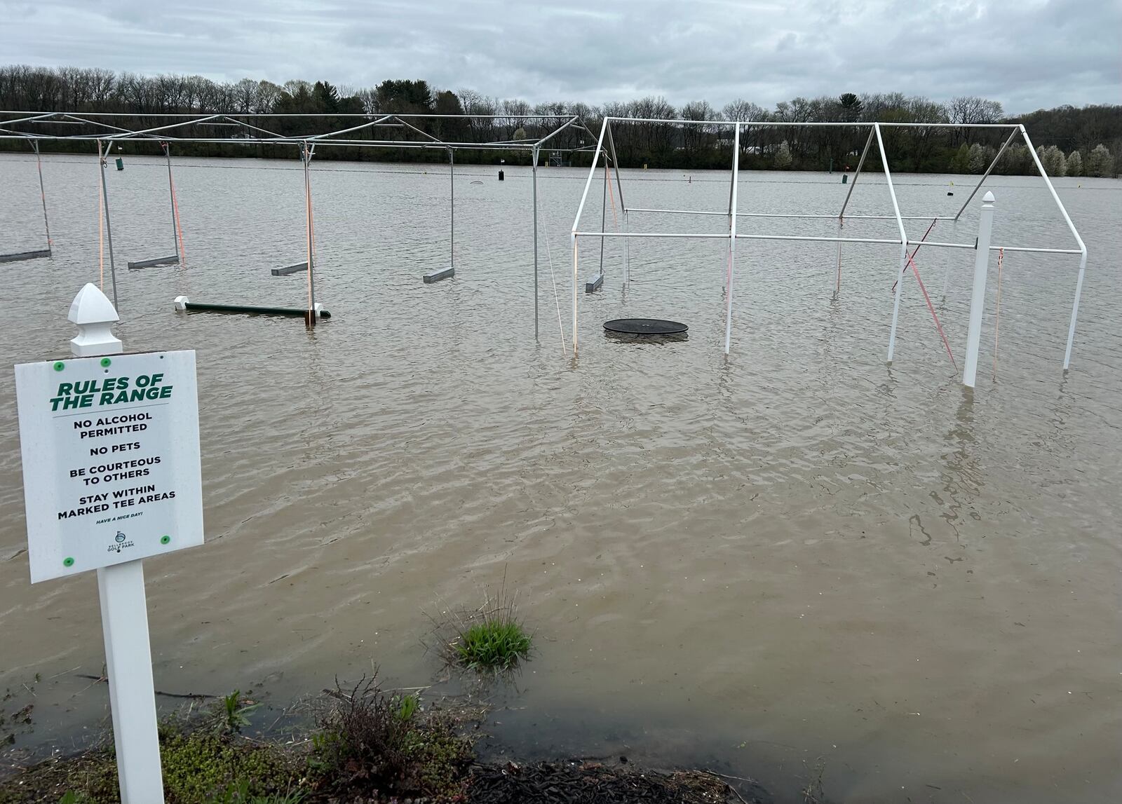The Bellbrook golf driving range (and adjacent Washington Mill Park) were annexed by the Little Miami River on Sunday, April 6, 2025, after days of rain. Jeremy P. Kelley / Staff