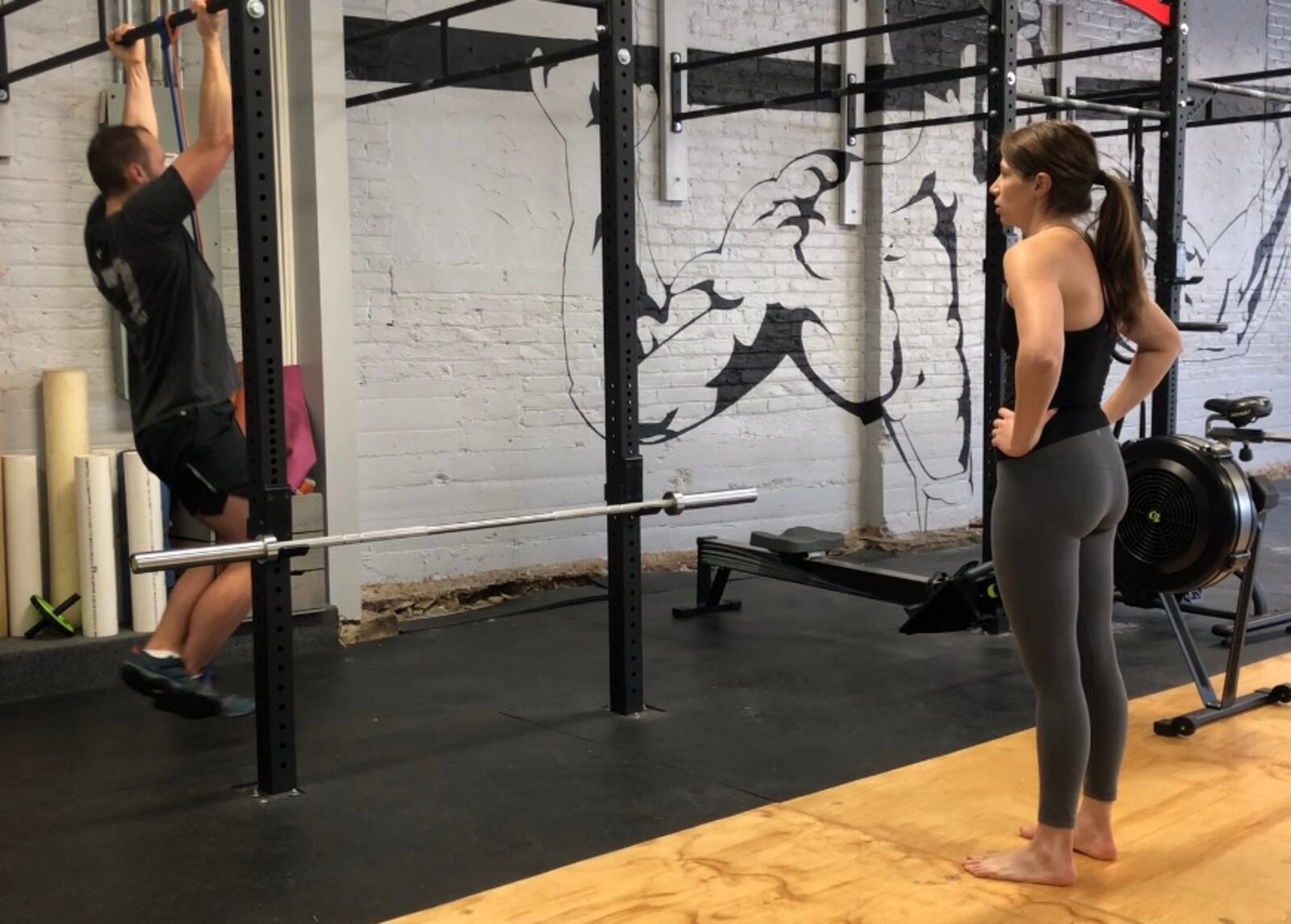 Heather in her BodiesbyHeather gym with clients