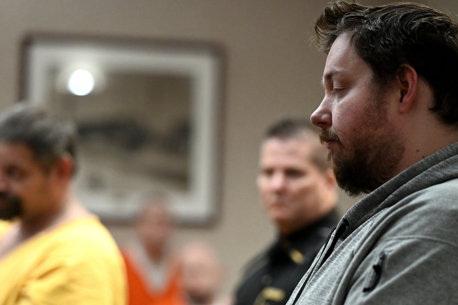 Nathan Isaacs, brother of Brittany Fuhr-Storms, spoke in court Thursday, requesting a high bond for Walter Edward Wade. MICHAEL D. PITMAN/STAFF