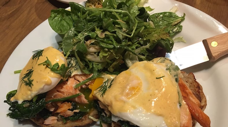 Wheat Penny's house-smoked Salmon Benedict is a must-try. A homemade dense but fluffy English muffin is topped with a generous amount of flavorful, tender in-house smoked salmon and topped with perfectly poached eggs and smoked tomato Hollandaise sauce. ALEXIS LARSEN/CONTRIBUTED