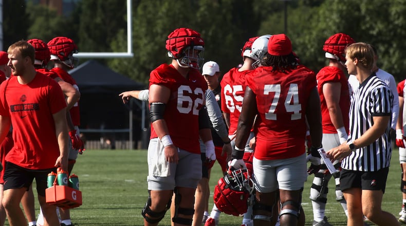 Lineman, including Josh Padilla (62), work at the first Ohio State football practice of the season on Thursday, Aug. 1, 2024, at the Woody Hayes Athletic Center in Columbus. David Jablonski/Staff