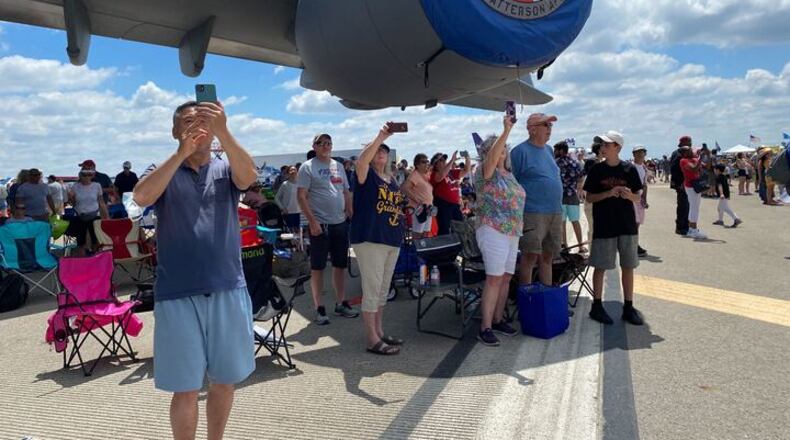 Crowds watch the CenterPoint Energy Dayton Air Show Sunday, July 31, 2022. ERIC SCHWARTZBERG