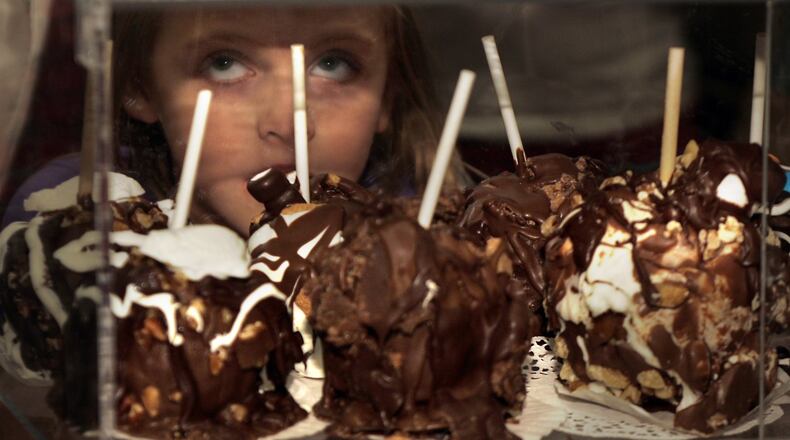 A display of buckeyes and chocolate covered apples during a previous Chocolate Festival at the Montgomery County Fairgrounds. STAFF FILE PHOTO