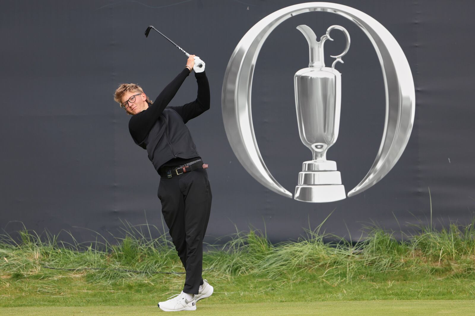Richard Teder of Estonia tees off the 1st during a practice round for the British Open golf championship at the Royal Portrush Golf Club, Northern Ireland, Tuesday, July 15, 2025. (AP Photo/Peter Morrison)