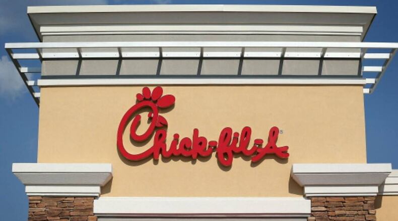 An employee at an Indianapolis Chick-fil-A keeps customers smiling with his drive-thru dance moves.